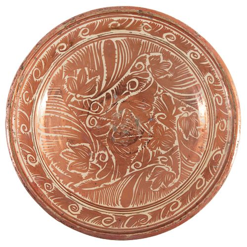 Platter. Manises, Spain, 18th century. Golden or metallic reflection earthenware with decorative plant motifs in metallic oxides.