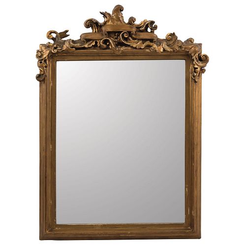 Mirror. Mexico, 19th century. Carved and gilded wooden frame. 20.2" (51.5 cm)