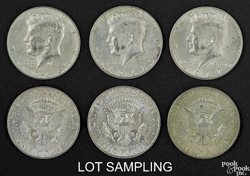 Ninety-nine silver clad Kennedy half dollars, 40% silver, average circulated.