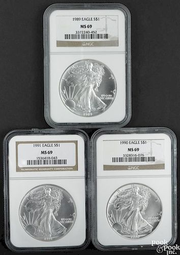 Three Walking Liberty silver Eagles, 1989-1991, NGC MS-69.