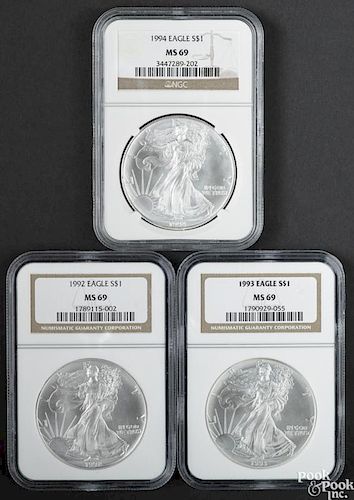 Three Walking Liberty silver Eagles, 1992-1994, NGC MS-69.