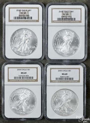 Four Walking Liberty silver Eagles, 2002-2005, NGC MS-69.