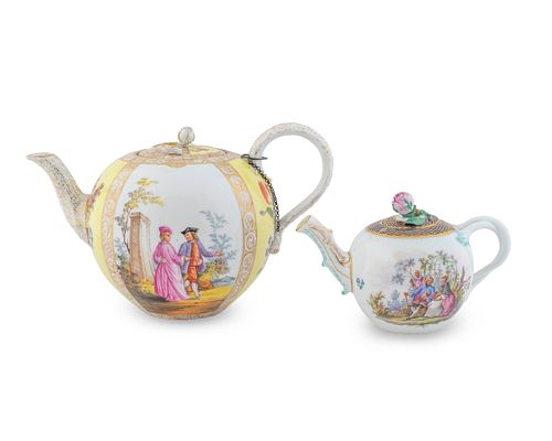 Two German Porcelain Teapots
Heights 4 /4 and 6 inches; lengths 6 1/4 and 9 1/2 inches.