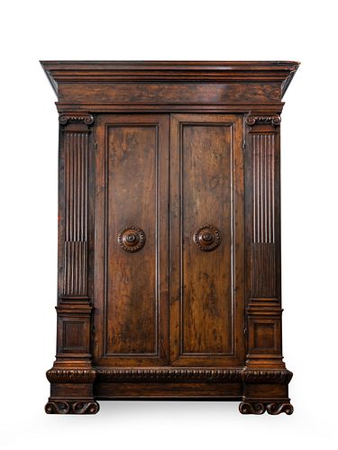 An Italian Renaissance Style Carved Walnut Armoire
Height 92 3/4 x width 68 x depth 23 1/2 inches.