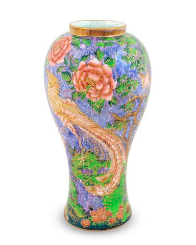 A Wedgwood Fairyland Lustre Argus Pheasant Candlemas Vase
Height 10 x diameter 5 inches.
