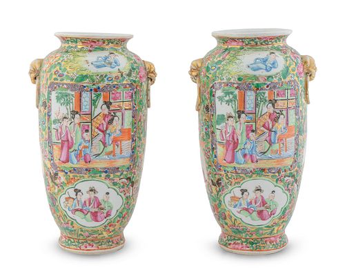 A Pair of Chinese Famille Rose Porcelain Vases
Height  9 1/2 x diameter 4 1/2 inches.