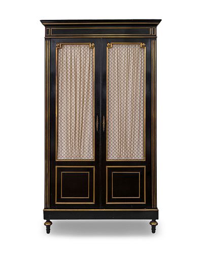 A Regency Style Ebonized and Gilt Metal Mounted Cabinet
Height 86 1/4 x width 49 x depth 17 1/2 inches.