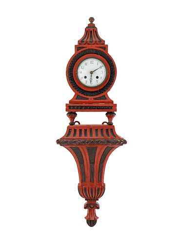 A Louis XV Style Black and Red Painted Bracket Clock
Total height 27 1/2 inches.