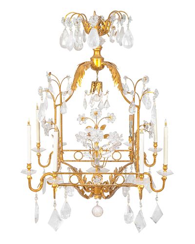 A Gilt Metal and Rock Crystal Six-Light Cage-form Chandelier
Height 50 x 32 inches square.