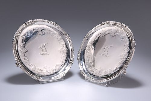 A PAIR OF GEORGE II SILVER WAITERS
 by John Swift,