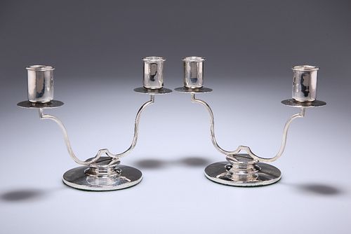 A PAIR OF GEORGE VI SILVER TWO-LIGHT CANDELABRA
 B