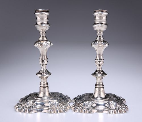 A PAIR OF GEORGE II SILVER CANDLESTICKS
 by Mary G