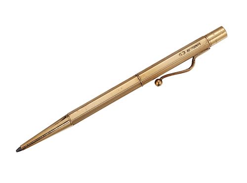 A GEORGE VI 9 CARAT GOLD PROPELLING PENCIL
 by E. 