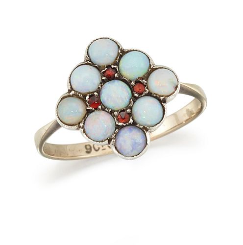 AN OPAL AND GARNET RING
 The square shaped mount s