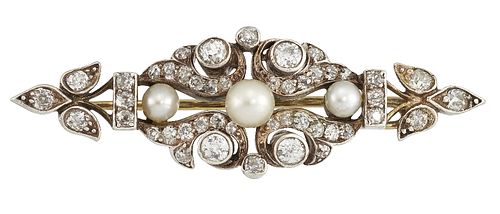 A DIAMOND AND CULTURED PEARL BROOCH
 Of scrolling 