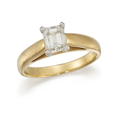 A SINGLE-STONE DIAMOND RING
 The claw-set emerald-