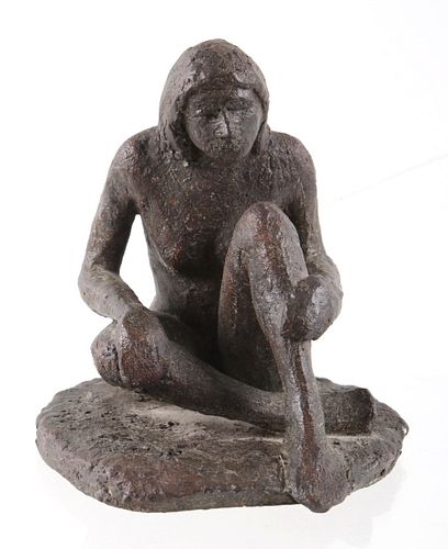 Signed Iron Sand Cast Seated Woman Statue