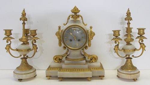 Gilt Bronze and Alabaster Clock Garniture Set.