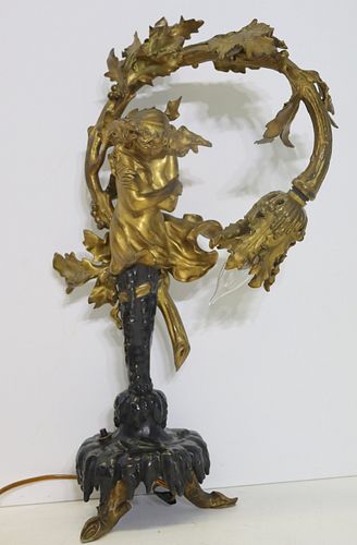 Gilt And Patinated Art Noveau Bronze Figural Lamp.