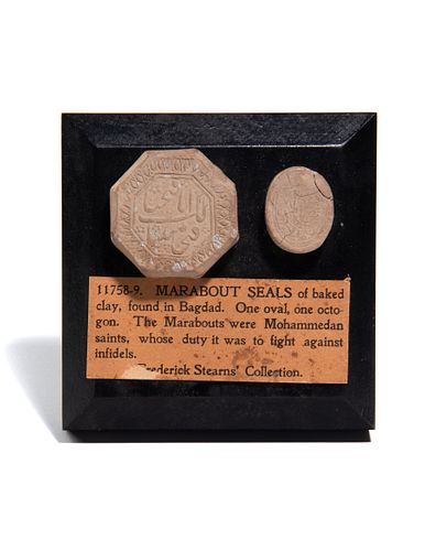 Two Islamic Pottery Turbahs or Seals Mounted on a Plaque