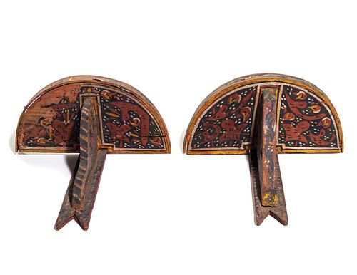 A Pair of Painted Wood Brackets
Height 16 7/8 inches.