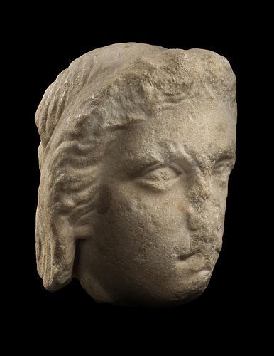 A Greek Fragmentary Marble Male Head
Height 7 7/8 inches.