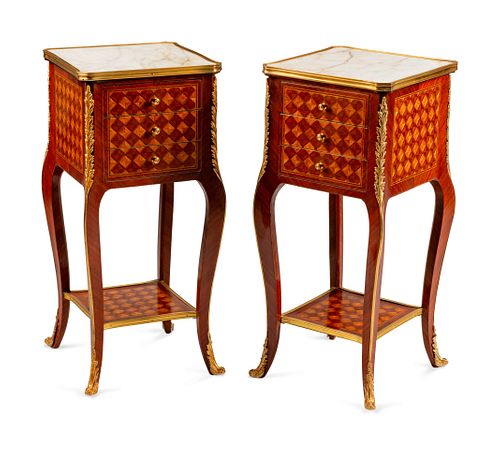 A Pair of Louis XV Style Gilt-Metal-Mounted Parquetry Tables de Nuit
Height 30 1/2 x width 14 1/2 x depth 14 1/2 inches.