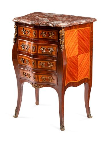 A Louis XV Style Kingwood and Tulipwood Petit Commode
Height 34 x width 25 x depth 17 1/2 inches.