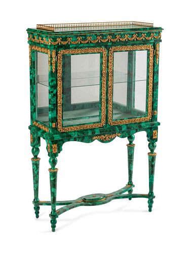 A Louis XVI Style Bronze-Mounted and Malachite-Veneered Vitrine Cabinet
Height 59 x width 37 1/2 x depth 15 inches.