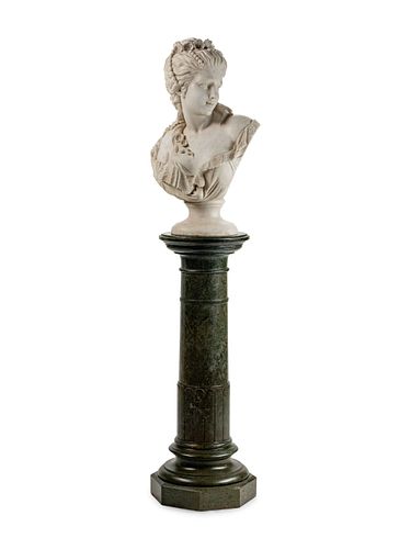 An Italian Carved Marble Bust of a Woman
Height overall 72 x width 21 x depth 15 inches.