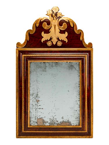 A Dutch Rococo Parcel-Gilt Walnut Mirror
Height 56 x width 31 1/2 inches.