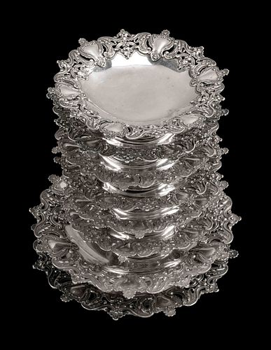 A Set of Eight Portuguese Silver Dessert PlatesHeight 3 x diameter 11 inches.