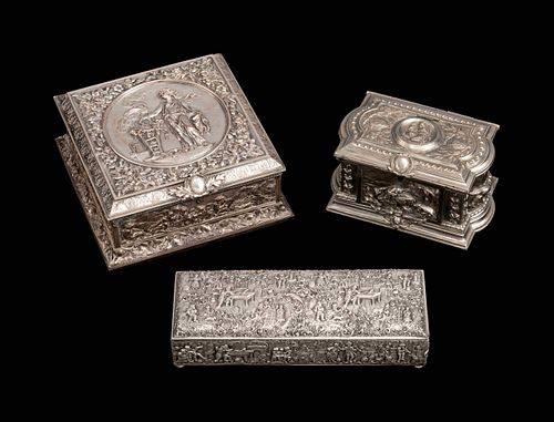Three Silverplated Boxes
Height 4 x length 8 1/2 x 8 1/2 inches.