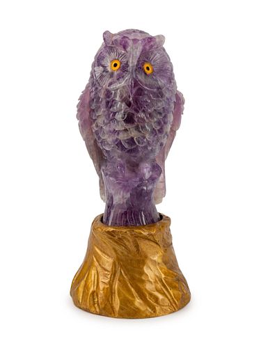 A Carved Amethyst Figure of an Owl
Height 13 1/2 x width 5 x depth 5 1/2 inches.