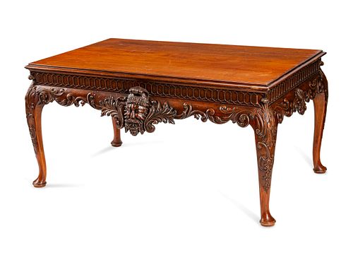 A George II Style Carved Mahogany Low Table
Height 24 x length 48 x depth 30 1/2 inches.
