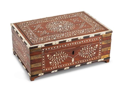 An Anglo-Indian Bone-Inlaid Fruitwood Casket
Height 5 x length 12 x depth 8 inches.