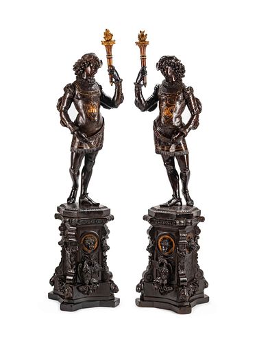 A Large Pair of English Parcel-Gilt and Stained Wood Figural Torcheres on Stands
Height 78 x width 17 x depth 16 inches.