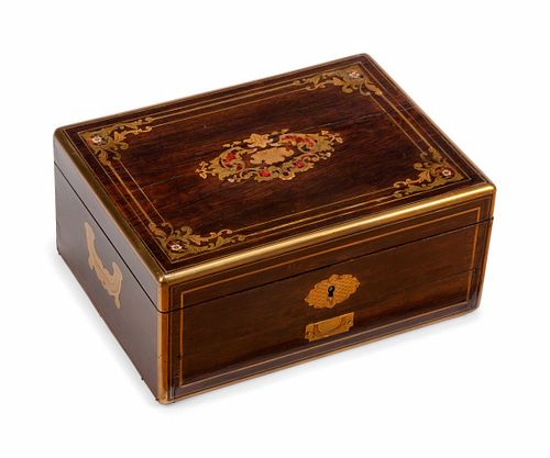 An English Brass-Inlaid Rosewood Dressing Set
Height 6 x length 13 x depth 9 1/2 inches.