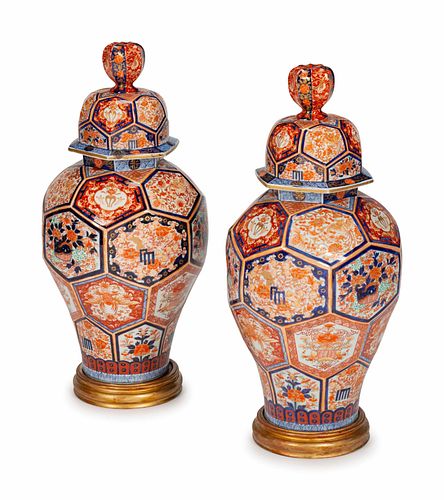 A Pair of Japanese Imari Porcelain Jars and Covers
Height 29 x diameter 13 inches.