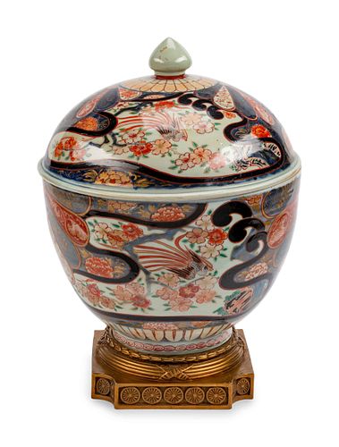 A Gilt-Bronze-Mounted Japanese Imari Porcelain Covered Bowl
Height 17 1/2 x diameter 12 inches.