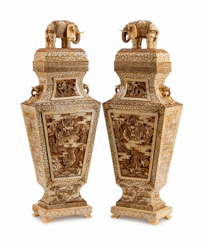 A Pair of Japanese Bone-Veneered Covered Vases on Stands
Height 30 x width 10 1/2 x depth 6 inches.