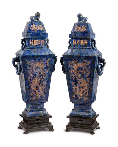A Pair of Chinese Inlaid and Engraved Lapis Lazuli-Veneered Vases and Covers
Height 47 x width 18 x depth 9 inches.