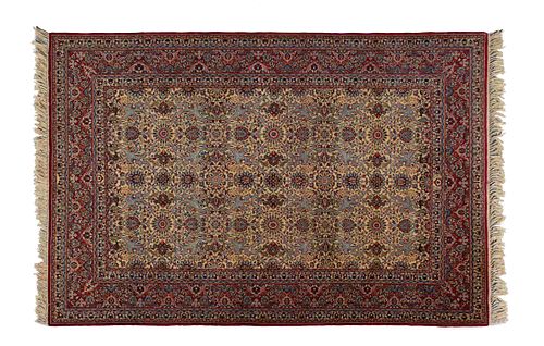 A  Silk and Wool Tabriz Rug
7 feet 4 inches x 5 feet.