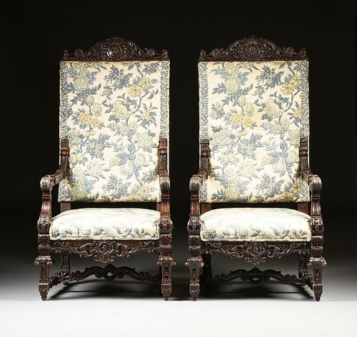 A PAIR OF ITALIAN BAROQUE REVIVAL UPHOLSTERED AND CARVED WALNUT THRONE ARMCHAIRS, LATE 19TH CENTURY,