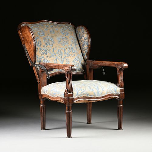 A LOUIS XVI UPHOLSTERED AND CARVED WALNUT ADJUSTABLE FAUTEUIL INCLINABLE, POSSIBLY PROVINCIAL, LATE 18TH/EARLY 19TH CENTURY,