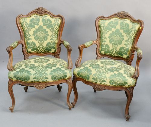 Pair of Louis XV style upholstered armchairs.