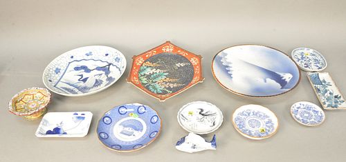 Group of Chinese porcelain to include three large chargers, two small trays, plates, etc., largest 14".Provenance: The Estate of Ed Brenner, Short Hil