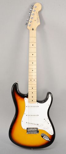 Fender Stratocaster in sunburst finish with original case, c. 2000, serial #M20221064.