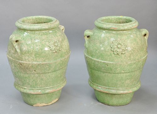 Pair of large green glazed urns, ht. 29".