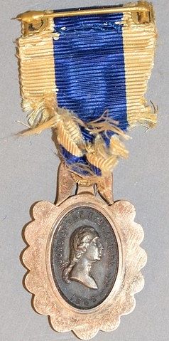 14K gold Bailey Banks & Biddle 1883 Revolution medal, "Sons of the Revolution" with silk ribbon.
